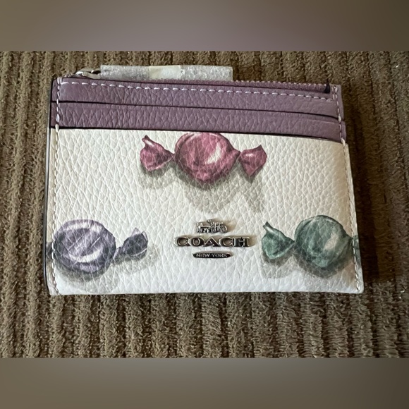 Coach Handbags - Coach Mini Skinny Id Case
With Candy Print And Charm NWT w/packaging